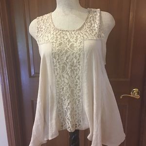 Sleeveless lace swing top.